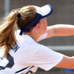 softball player catching ball